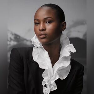 Never Fully Dressed Sleeveless White Ruffled Blouse